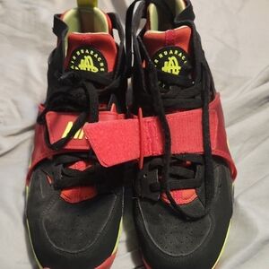 Men's Nike Red and Black Sneakers with Cross-Strap Design